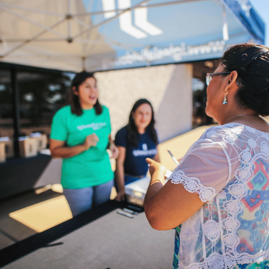 Health advocates speaking with community members